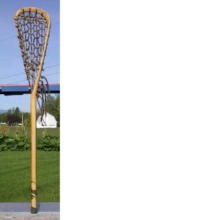 vintage wooden lacrosse stick. Measures 38 long. The lacrosse stick