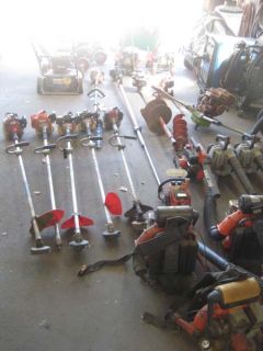 Large Lot of Landscaping Equipment Blowers Saws Edger