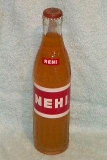 Full 10 oz 1960s NEHI Peach Soda Bottle from Lumberton N C