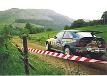 Cosworth on a stage rally, driven by British driver Malcolm Wilson
