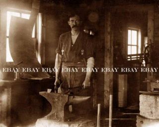 Photo of An Old West Western Blacksmith Shop Black Smith Making A