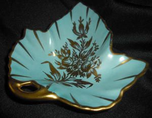 This elegant, sky blue and gold piece is 4.25 long x 4.125 wide and