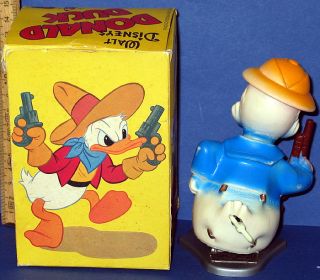 Donald Duck Tropendonald mit Gewehr  Walt Disney Geyper Figur in OVP